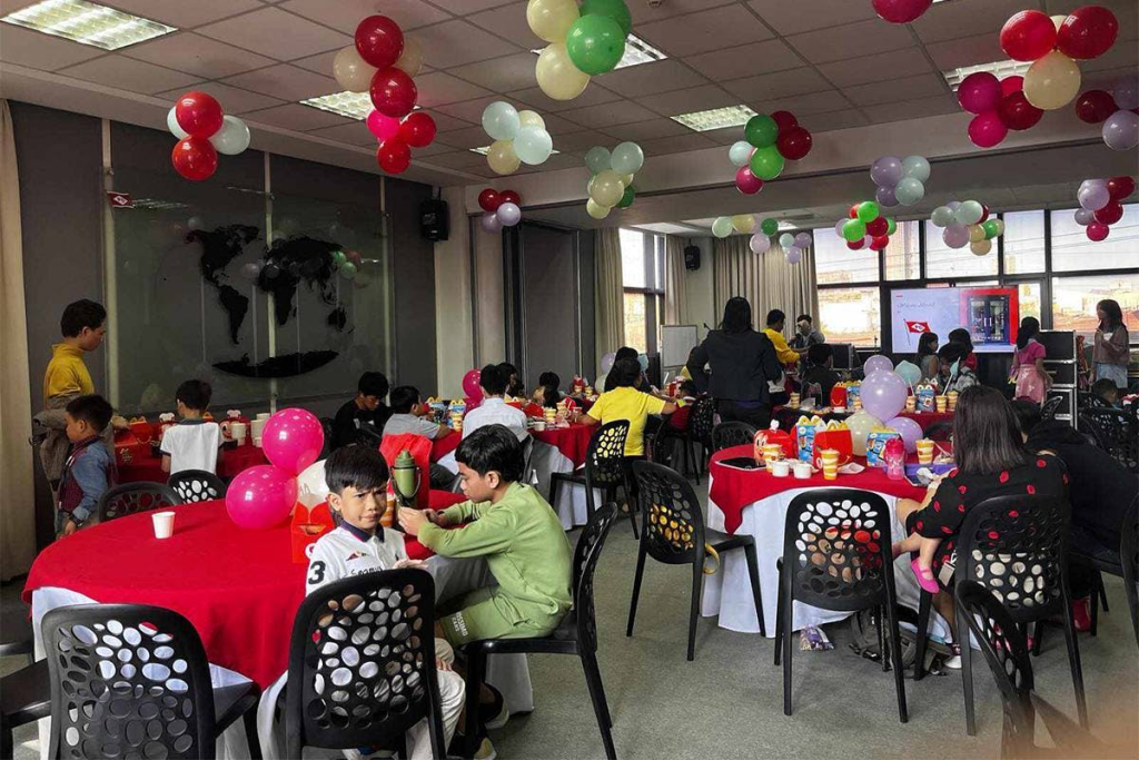 Children of Döhle Group’s seafarer-members enjoy some treats during a family hub set up by the company on Nov. 17, 2023 in their office in Makati City.